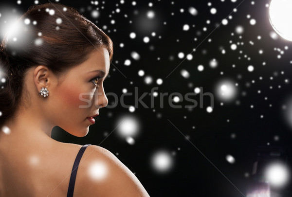 Kobieta suknia wieczorowa diament kolczyki luksusowe Zdjęcia stock © dolgachov