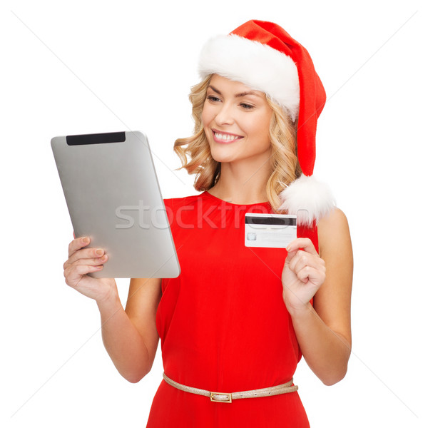 woman with tablet pc and credit card Stock photo © dolgachov