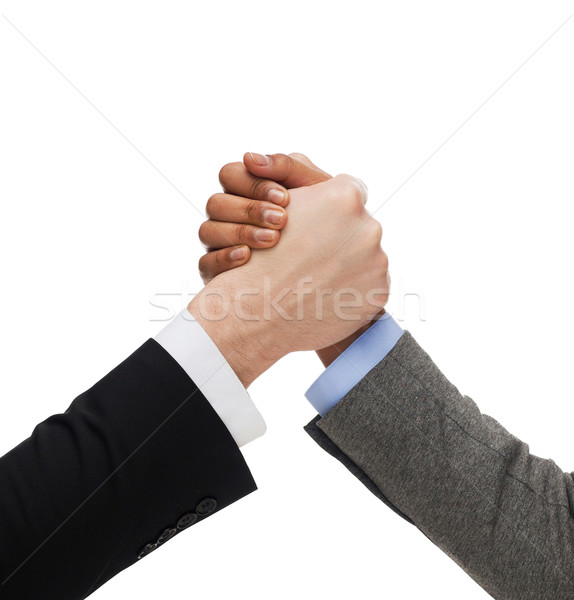 Handen twee mensen business concurrentie man vrouwen Stockfoto © dolgachov