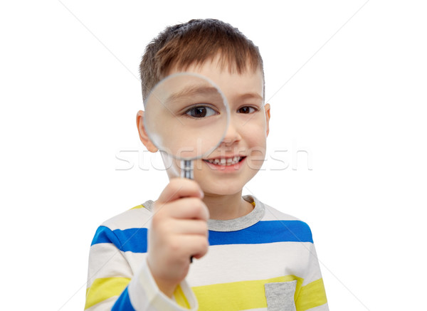 счастливым мало мальчика глядя увеличительное стекло детство Сток-фото © dolgachov