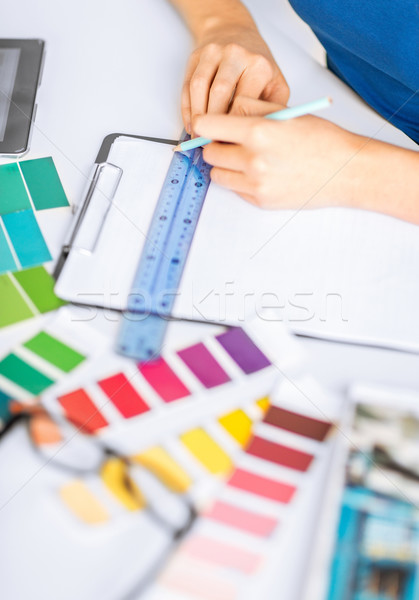 woman working with color samples for selection Stock photo © dolgachov