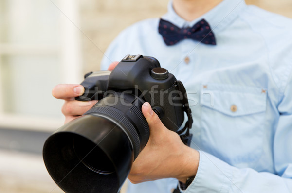 Mężczyzna fotograf aparat cyfrowy ludzi fotografii Zdjęcia stock © dolgachov