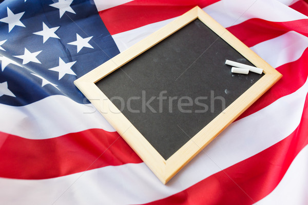 close up of school blackboard on american flag Stock photo © dolgachov