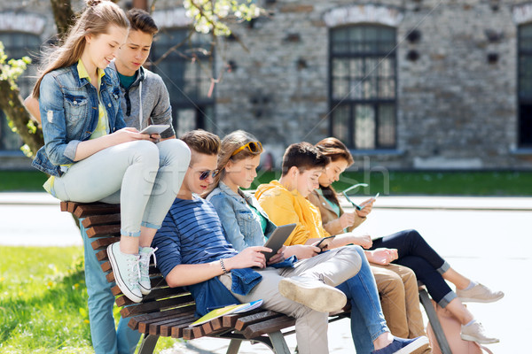 group of students with tablet pc at school yard Stock photo © dolgachov