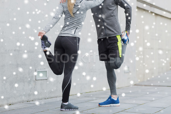 Stock fotó: Közelkép · pár · nyújtás · lábak · kint · fitnessz