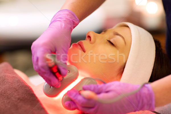 young woman having face microdermabrasion at spa Stock photo © dolgachov