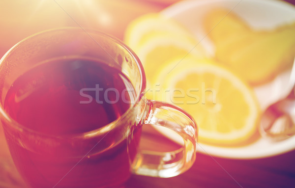tea cup with lemon and ginger on plate Stock photo © dolgachov