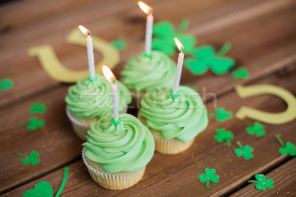 green cupcakes, horseshoes and shamrock Stock photo © dolgachov