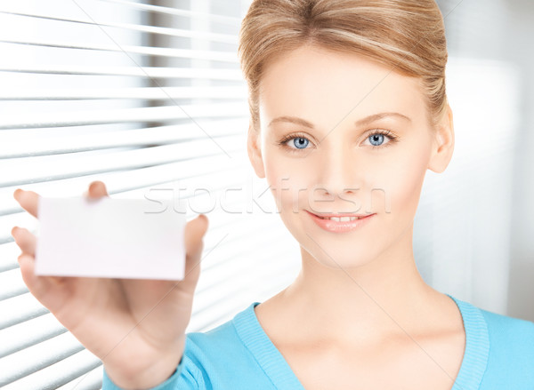 woman with blank business or name card Stock photo © dolgachov