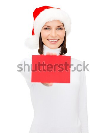 woman in santa helper hat with blank red card Stock photo © dolgachov