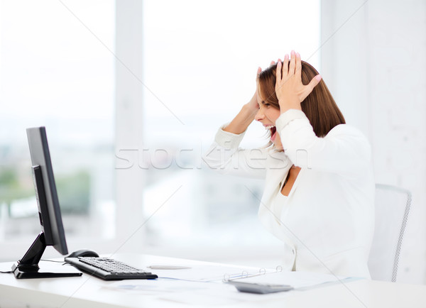 Stock photo: stressed woman with computer