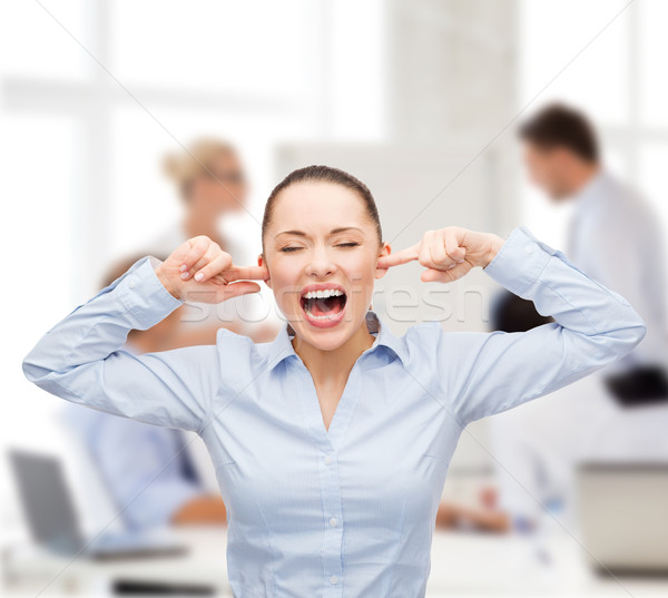 angry screaming businesswoman Stock photo © dolgachov
