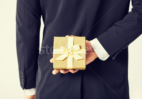 man hands holding gift box Stock photo © dolgachov