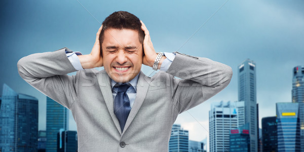 бизнесмен костюм голову боль деловые люди кризис Сток-фото © dolgachov