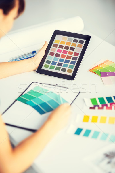 woman working with color samples for selection Stock photo © dolgachov