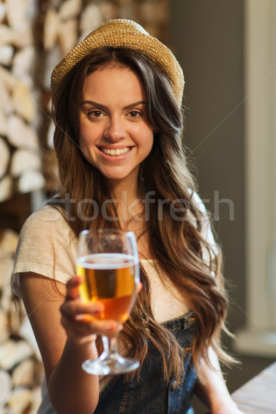 Stockfoto: Gelukkig · jonge · vrouw · drinkwater · bar · pub · mensen