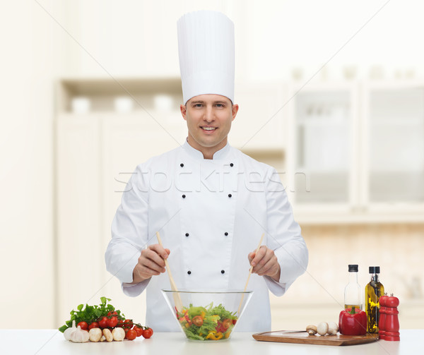 happy male chef cook cooking food Stock photo © dolgachov