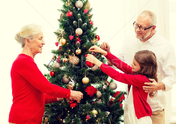 Glimlachend familie kerstboom home vakantie generatie Stockfoto © dolgachov