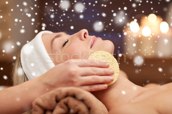 close up of woman having face cleaning in spa Stock photo © dolgachov