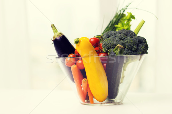 close up of ripe vegetables in glass bowl on table Stock photo © dolgachov