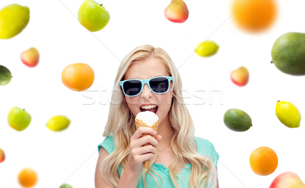 happy young woman in sunglasses eating ice cream Stock photo © dolgachov