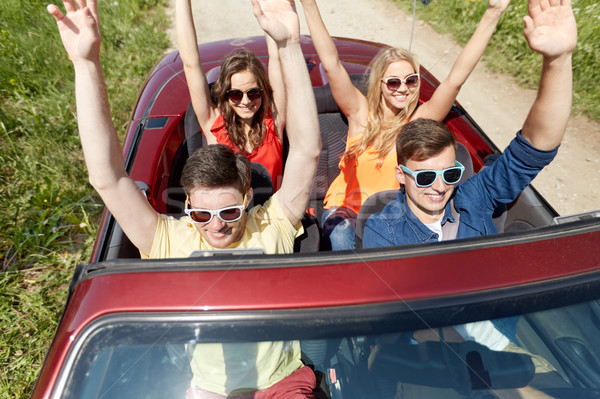 Boldog barátok vezetés cabrio autó vidék Stock fotó © dolgachov