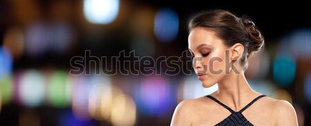beautiful young asian woman with earring Stock photo © dolgachov