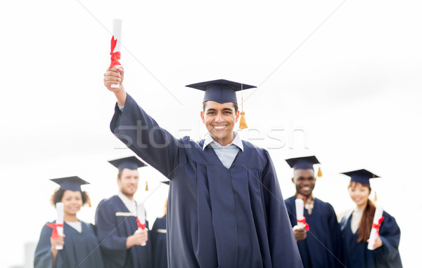 Szczęśliwy studentów edukacji ukończeniu ludzi grupy Zdjęcia stock © dolgachov