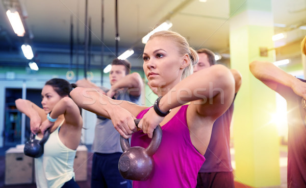 Groupe de gens gymnase sport fitness haltérophilie [[stock_photo]] © dolgachov