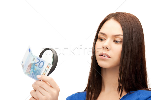 Vrouw vergrootglas euro cash geld mooie vrouw Stockfoto © dolgachov