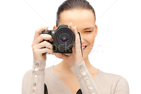 teenage girl with digital camera Stock photo © dolgachov