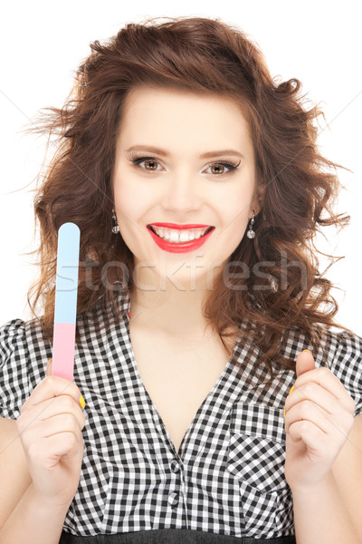 beautiful woman polishing her nails Stock photo © dolgachov