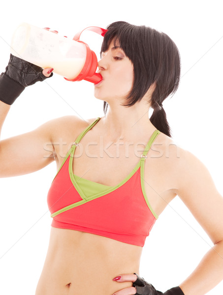 fitness instructor with protein shake Stock photo © dolgachov