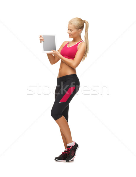 sporty woman with tablet pc Stock photo © dolgachov