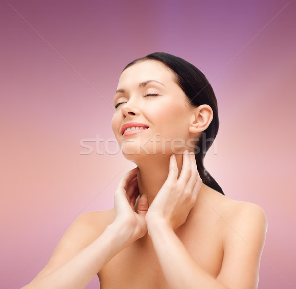 smiling young woman with closed eyes Stock photo © dolgachov
