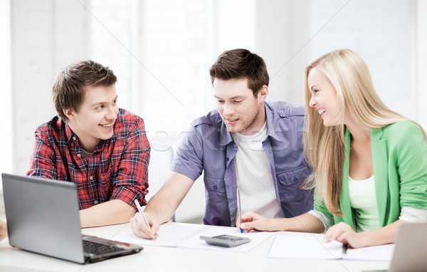 students chatting in lecture at school Stock photo © dolgachov
