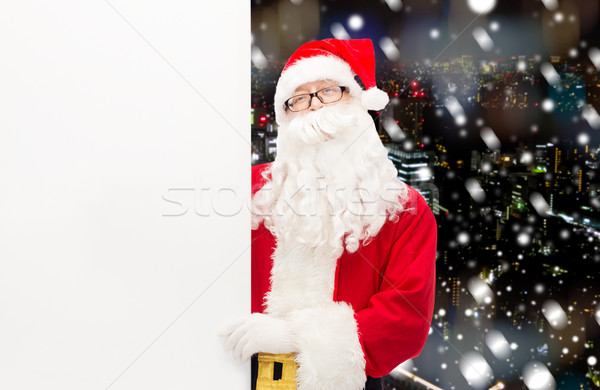 Homem traje papai noel quadro de avisos natal férias Foto stock © dolgachov