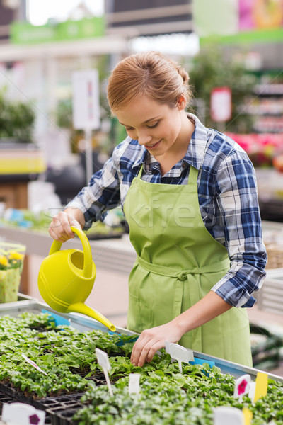 [[stock_photo]]: Heureux · femme · arrosoir · effet · de · serre · personnes · jardinage