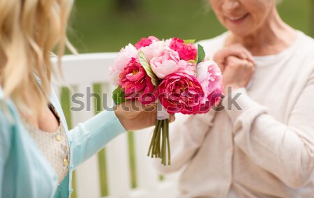 Feliz lesbianas Pareja flores personas Foto stock © dolgachov