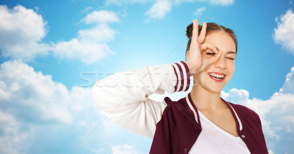 Stock photo: happy teenage girl making face and having fun