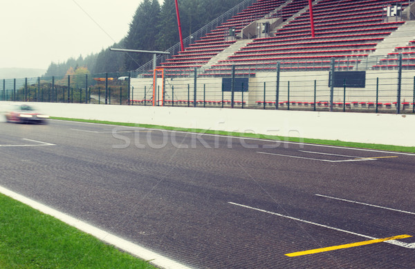 close up of car driving on speedway track or road Stock photo © dolgachov