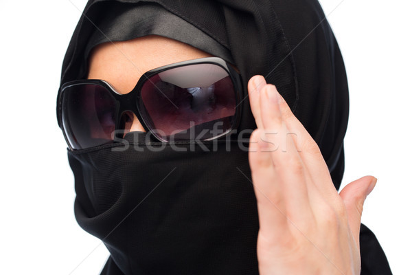 close up of muslim woman in hijab and sunglasses  Stock photo © dolgachov