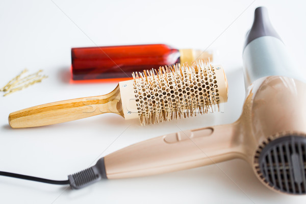 hairdryer, brush, hot styling hair spray and pins Stock photo © dolgachov
