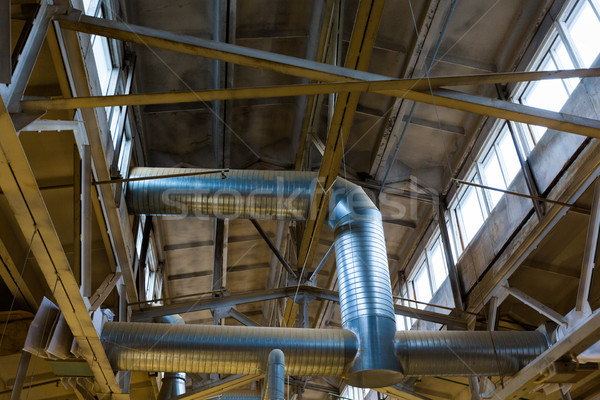 ventilation pipes at factory shop Stock photo © dolgachov