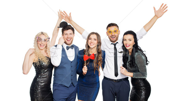 happy friends with party props posing Stock photo © dolgachov