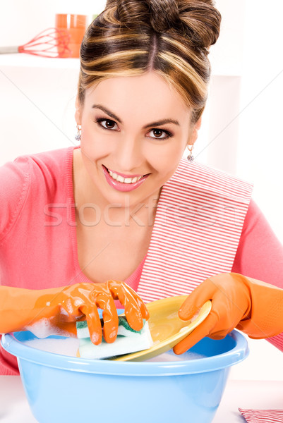 housewife washing dish Stock photo © dolgachov