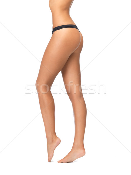 Vrouwelijke benen zwarte bikini slipje foto Stockfoto © dolgachov