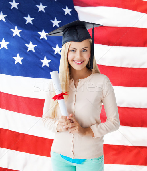 Estudante graduação boné certidão feliz bandeira americana Foto stock © dolgachov