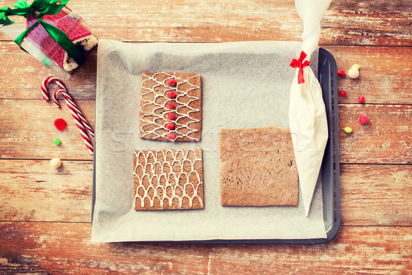 closeup of gingerbread house details on pan Stock photo © dolgachov