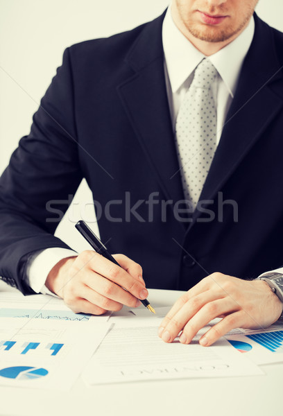 man with contract Stock photo © dolgachov